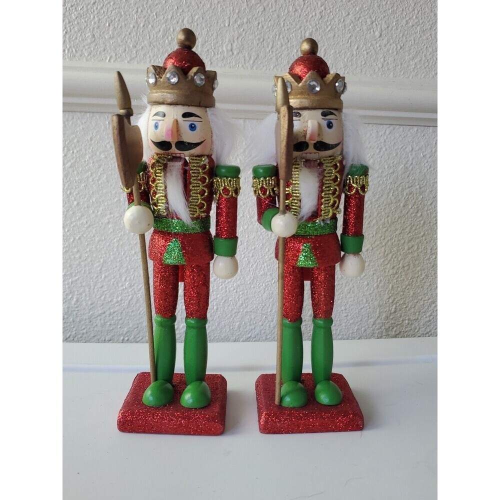 Two decorative‎ Nutcracker Dolls. Sold As A Set. Dolls Show Signs Of Wear.